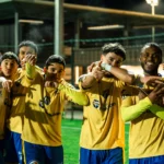 Célébration des joueurs du MFCTG après une action de match