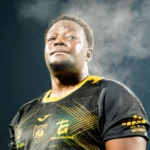 Portrait d’un joueur de rugby marqué par l’effort lors d’un match